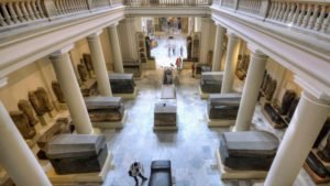 Image of the hall of sarcophagi inside the Cairo Musuem.