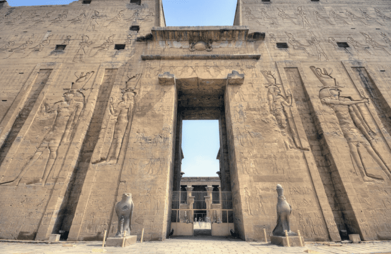Entrance to Edfu Temple with the God Horus standing guard on both sides